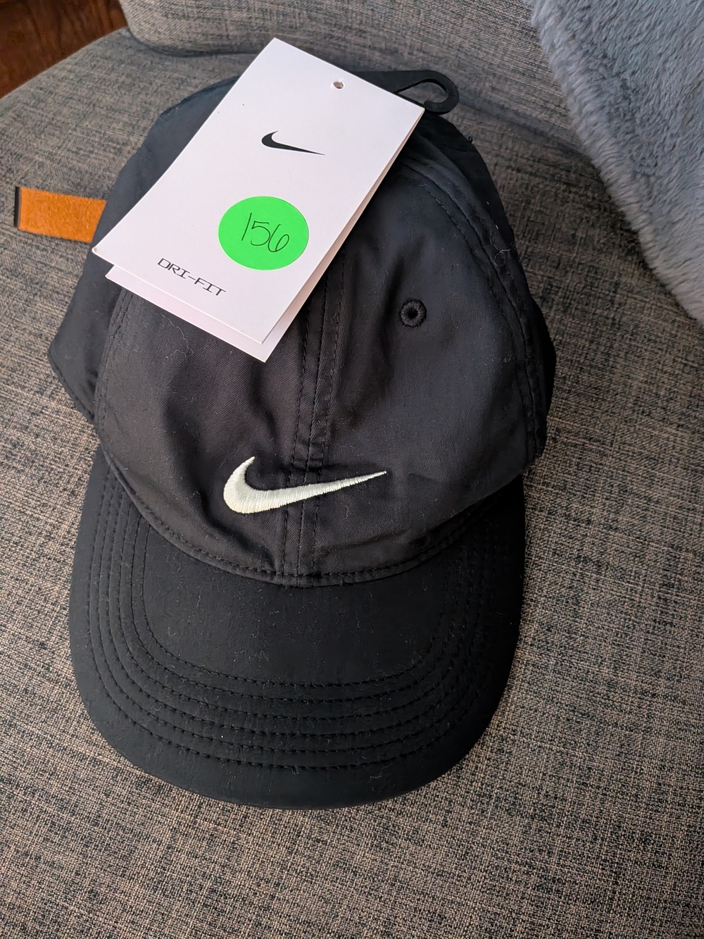 Nike Black Cap with White Swoosh Logo